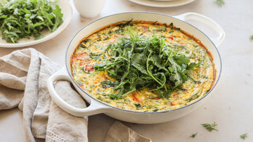 Smoked Salmon Frittata with Feta Herbs Topped with Arugula Salad